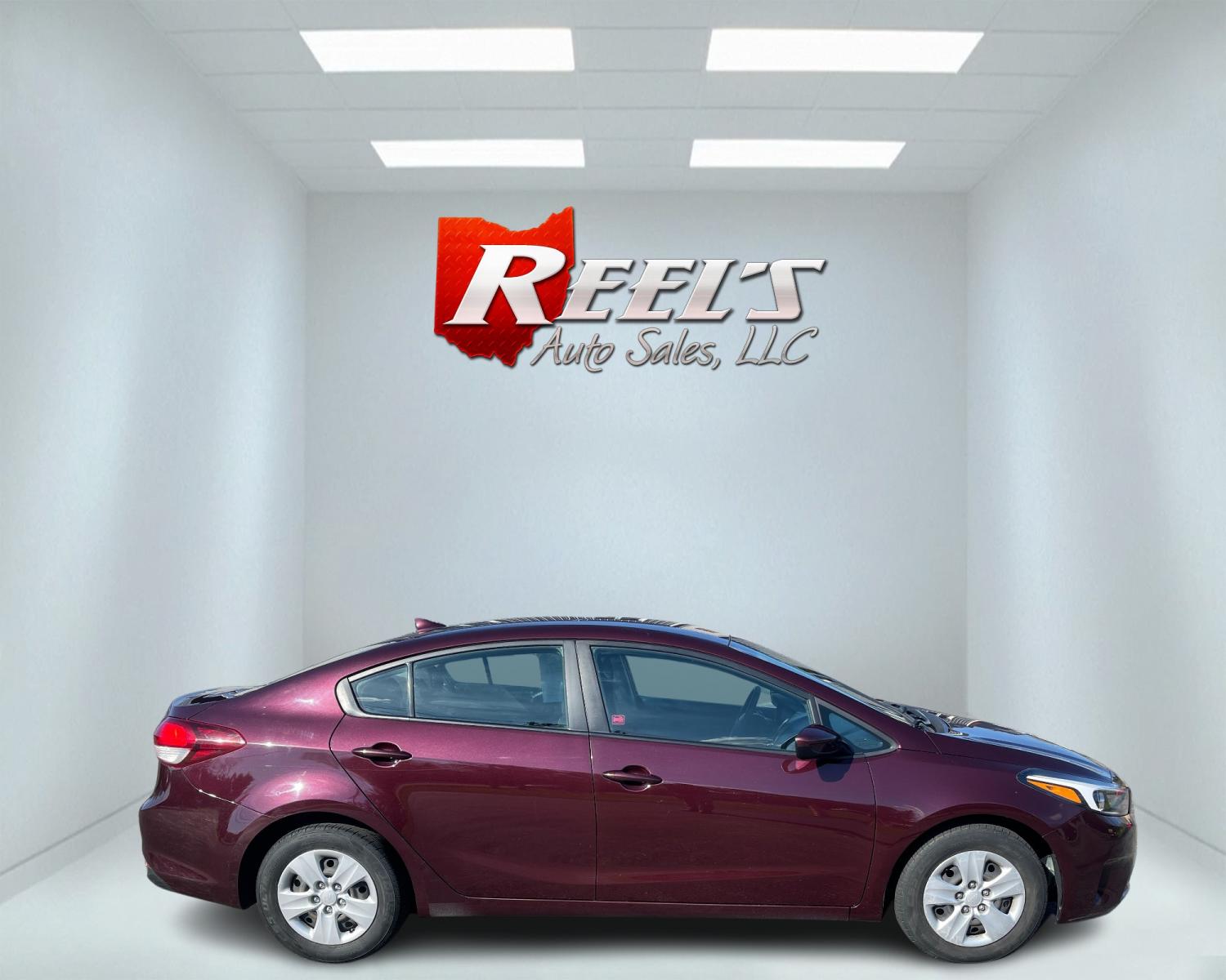 2017 Red /Black Kia Forte LX 6A (3KPFK4A76HE) with an 2.0L I4 DOHC 16V engine, 6A transmission, located at 11115 Chardon Rd. , Chardon, OH, 44024, (440) 214-9705, 41.580246, -81.241943 - This 2017 Kia Forte LX is a well-equipped compact sedan with a 2.0-liter four-cylinder engine paired with a smooth-shifting six-speed automatic transmission. It offers convenient features like daytime running lights, USB audio input, and Bluetooth connectivity for seamless audio streaming. Additiona - Photo #4